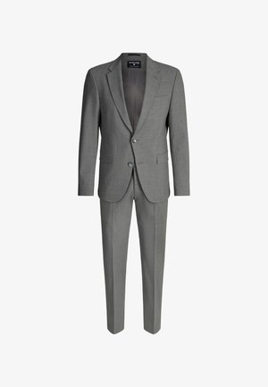 Grijs pak gemaakt van gestructureerde stof, voorzien van een notched rever, twee knopen en recht vallende broekspijpen. Binnenkant gevoerd met een donkerdere tint.