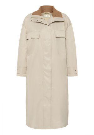 Beige lang frakke med brun ribbet krave, forreste trykknapper, to brystlommer med klap og knappede manchetter, designet til køligere vejr.