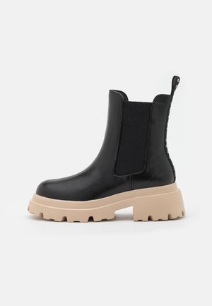 Platform ankle boots - black