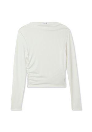 Top bianco a maniche lunghe con scollatura rotonda e arricciature laterali, realizzato in tessuto morbido. Lunghezza crop con cuciture minime.