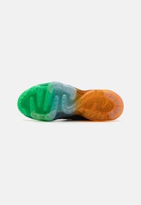 Multicolor sneaker sole featuring curved gel sections in green, blue, and orange, with textured patterns and visible tread details.