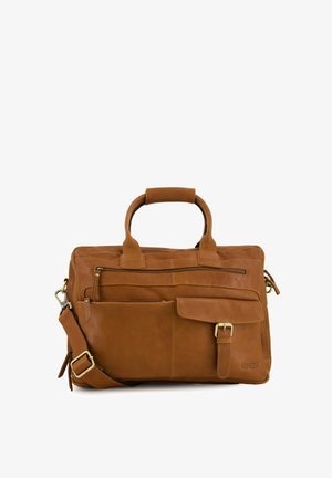 Brown leather bag with dual top handles, adjustable shoulder strap, front flap pocket, and zipper compartments. Smooth texture, minimalist design.