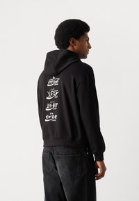 Antony Morato HOODIE BOXY FIT WITH FLOCK AND RUBBER INJECTION LOGO PRINT - Sweater - black