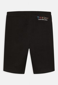 Calvin Klein Jeans PRIDE MONOGRAM CYCLING UNISEX - Šortky - ck black