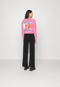 Vero Moda VMGOLD NEEDLE TROUSERS - Calças - black