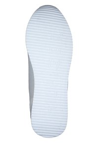 Semelle en caoutchouc blanche avec des rainures et des crêtes texturées, présentant un bord lisse. Contours pour offrir adhérence et flexibilité.