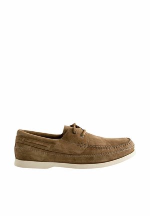 Brown suede casual lace-up loafer with white sole, visible stitching details, and low-profile design.