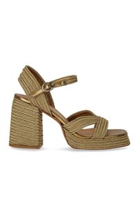 Χρυσή σαμπό από σχοινί με ψηλό τακούνι, χαρακτηριστικά ευρείας λουρίδας και πόρπη στον αστράγαλο. Υφασμάτινος μπλοκ τακούνι για σταθερότητα και πρόσφυση.