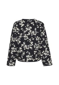 Quilted navy jacket featuring a floral pattern in white and gray. Round neckline and long sleeves with a slightly cropped cut.