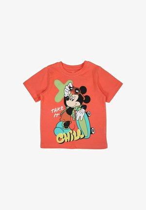 T-shirt en coton corail présentant un graphisme d'un personnage de dessin animé portant des lunettes de soleil, sur un skateboard, avec le texte "TAKE IT CHILL". Manches courtes et col rond.