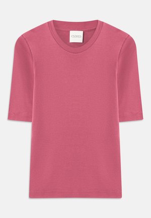 Korte mouw T-shirt van zacht roze katoen met een ronde hals. Heeft stikselaccenten aan de randen en een rechte snit.