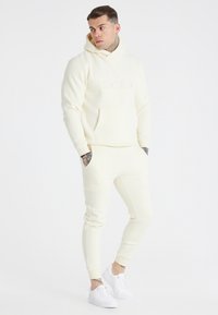 SIKSILK MESSI X SIKSILK CUFFED PANT UNISEX - Träningsbyxor - ecru