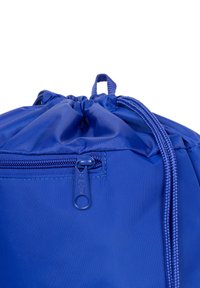 Kungligt blå dragsko väska gjord av hållbar nylon med en dragkedjeficka och strukturerad yta, med flätade snören och dragsko topp.