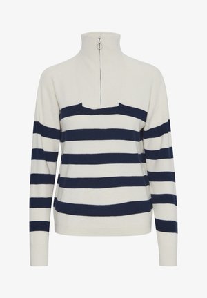 Suéter de rayas blancas y marinas con cuello alto y cierre de cremallera frontal. Textura acanalada, mangas largas y un diseño de corte relajado.