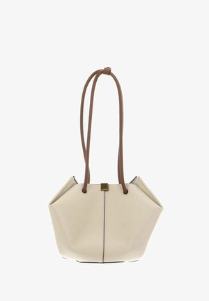 Beige handbag with a geometric shape and long brown leather straps, featuring a central metal clasp on a plain background.