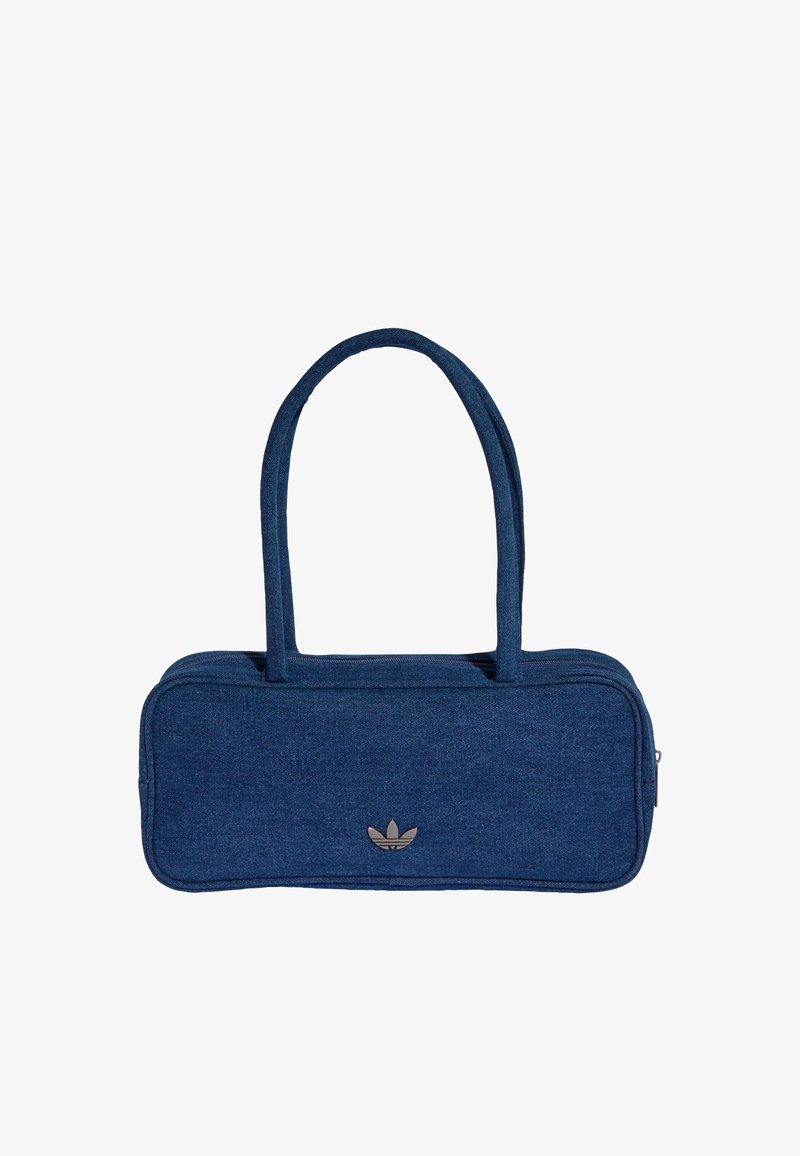 Blue denim bag with two handles, rectangular shape, zip closure, and a small metallic logo on the front. Smooth texture and minimal design.