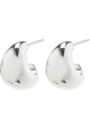 Paire de boucles d’oreilles clous en argent poli en forme de croissant avec tiges droites sur fond blanc.