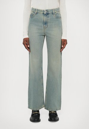 EVY ECO - Jeans a zampa - light blue