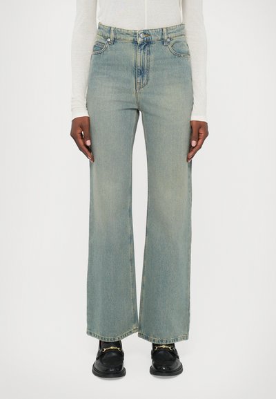 Lyseblå vidde jeans i denimstof med høj talje, stiklommer og lige pasform ned til kanten.