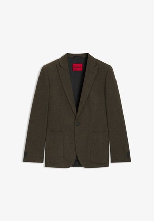 Brun tweedblazer med slagkrage, enkelknap stängning, två framfickor och svart foder. Har knappar med tre knappar vid ärmarna.