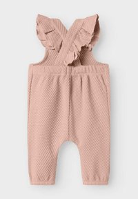 Rompers intrecciato rosa con bretelle incrociate a volants, vita elastica e vestibilità rilassata con aperture alla gamba larghe. Dettaglio in tessuto testurizzato.