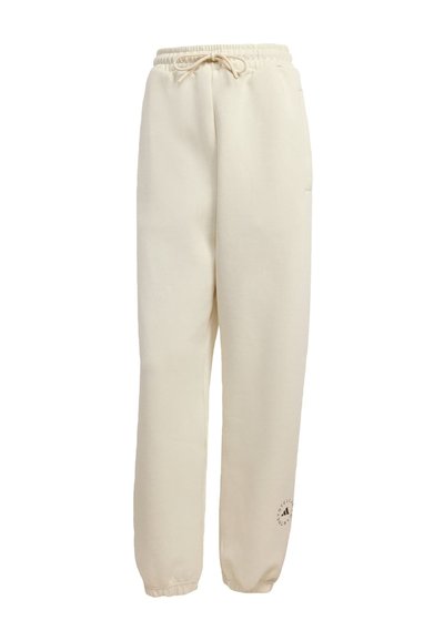 Beige sweatpants met een elastische tailleband en cuffs, een trekkoord in de taille, zijzakken en een klein logo dichtbij de onderzoom op het linkerbeen.