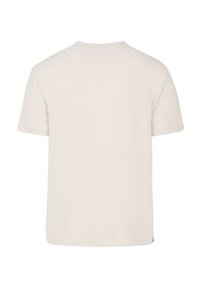 Světle krémové tričko s krátkými rukávy, kulatým výstřihem a volným střihem. Hladký bavlněný povrch, minimalistický design, žádné viditelné vzory ani akcenty.