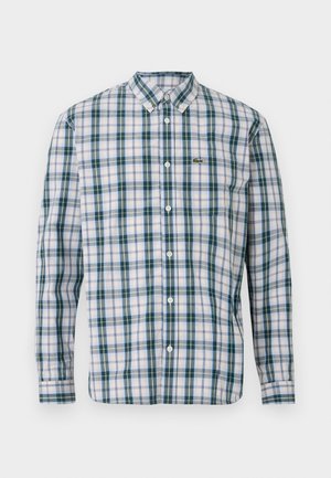 Camisa de manga longa xadrez em branco, verde e azul claro. Apresenta um colarinho com botão e um pequeno logótipo bordado no peito.