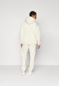 ICANIWILL EVERYDAY SWEATPANTS MEN - Jogginghose - cream