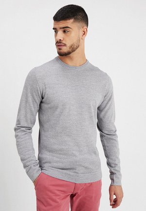 Lys grå langærmet sweater med rund hals og ribbede manchetter. Fremstillet af blødt strikmateriale, der har en glat overflade og en afslappet pasform.