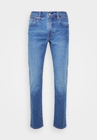512™ SLIM TAPER - Pieguloša piegriezuma džinsi - light indigo worn in