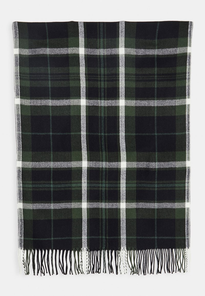 Écharpe à carreaux vert foncé et noir avec des rayures blanches et des bords frangés, étalée à plat sur un fond blanc.