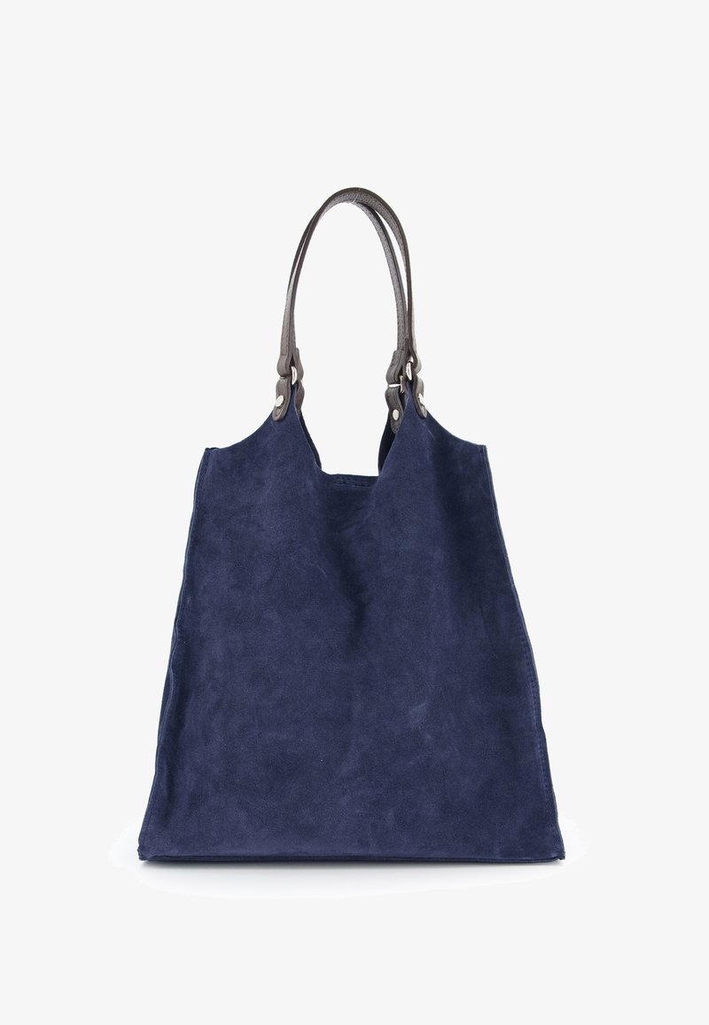 Navy-suede Tragetasche mit großzügiger Form, glatter Textur und braunen Ledergriffen mit metallischen Hardware-Akzenten.