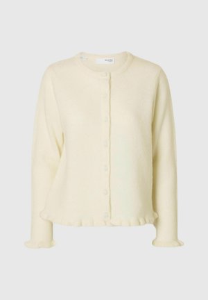 Kremfarget cardigan for kvinner med knapper, langt erme og rysjekanter på mansjetter og nederkant.