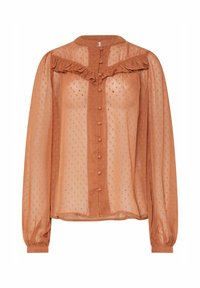 Long-sleeved blouse in rust-colored sheer fabric with a ruffled yoke, button closure, and textured polka dot pattern throughout.