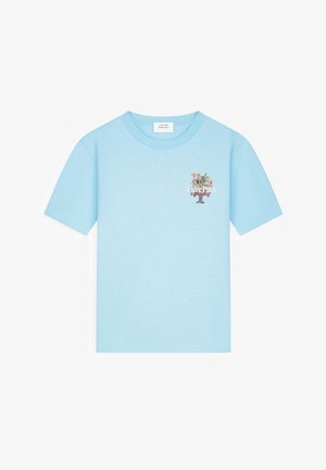 Light blue short-sleeve T-shirt with a small floral graphic and the text "Pure Pain" on the left chest area.