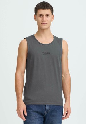 Grå ærmeløs tanktop lavet af blødt stof, med rund hals og et sort "UNLIMITED" tryk på forsiden.