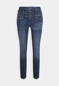 Jeans de denim azul ajustados con una cintura alta, que cuentan con cierre de tres botones, cinco bolsillos y un ligero desvanecimiento en las piernas.