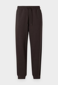 Dark brown sweatpants made from soft fabric. Features an elastic waistband with a drawstring, tapered legs, and ribbed cuffs at the ankles.