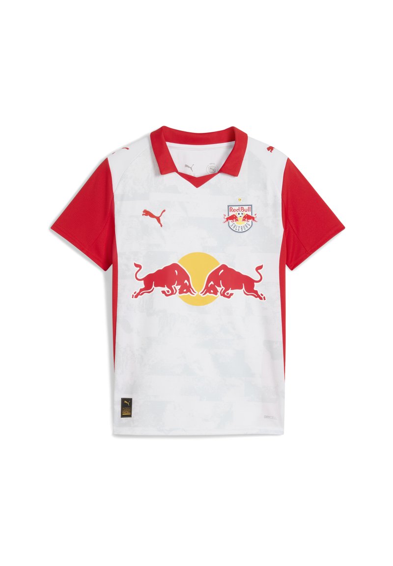 Červený a biely futbalový dres s výstrihom do V, krátkymi rukávmi a grafickým vzorom. Zobrazuje logo Red Bull a branding Puma.