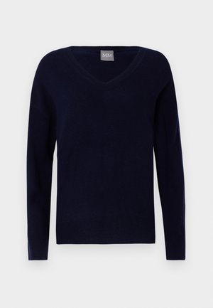 Mornarska pulover s V-izrezom napravljen od mekanog pletenog materijala; ima dugačke rukave i ravan rub s rebrastim detaljima na manžetama i donjem rubu.