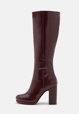 High heeled boots - red