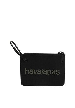 Bustina rettangolare nera con cerniera, logo "havaianas" grigio e piccolo moschettone nero attaccato.