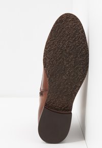 Caprice Schnürstiefelette - cognac