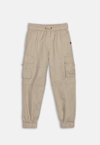 Beige cargobroek met een elastische tailleband, een trekkoord en geborduurde enkels; voorzien van meerdere zijzakken en gestikte details.