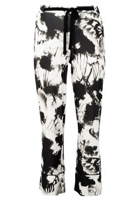 Zwart-witte yogabroek met abstract vlinderpatroon, elastische tailleband met trekkoord, getailleerd ontwerp en splitten bij de enkels.