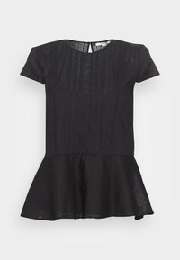 Top peplum negro con mangas cortas, que presenta una tela texturizada, rayas verticales y un cierre de botón en la parte posterior.