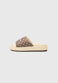 Slip-on sandals featuring a brown patterned upper with geometric design, cream midsole, and textured brown outsole for grip.