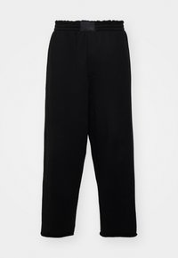 MINIMAL - Jogginghose - black