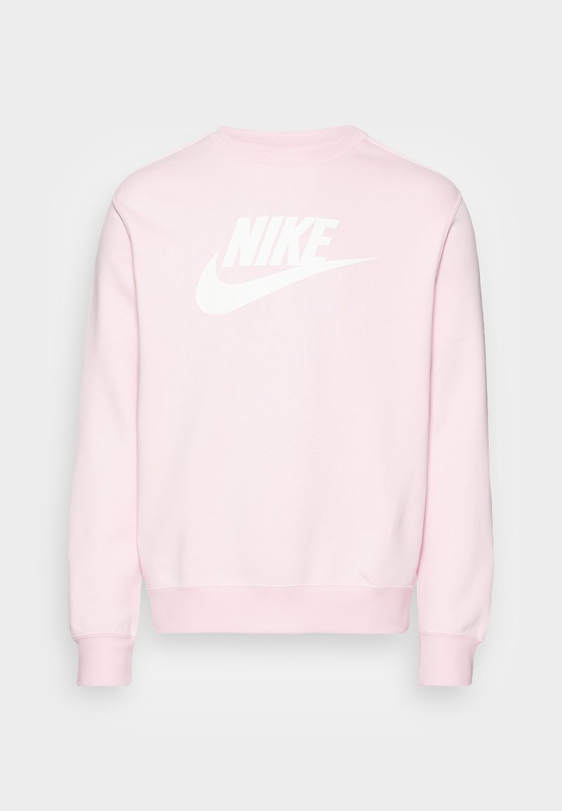 Różowa bluza z bawełnianej mieszanki, z białym logo "NIKE" na plecach, ściągaczami przy mankietach i na dole. Casualowy fason z okrągłym dekoltem.